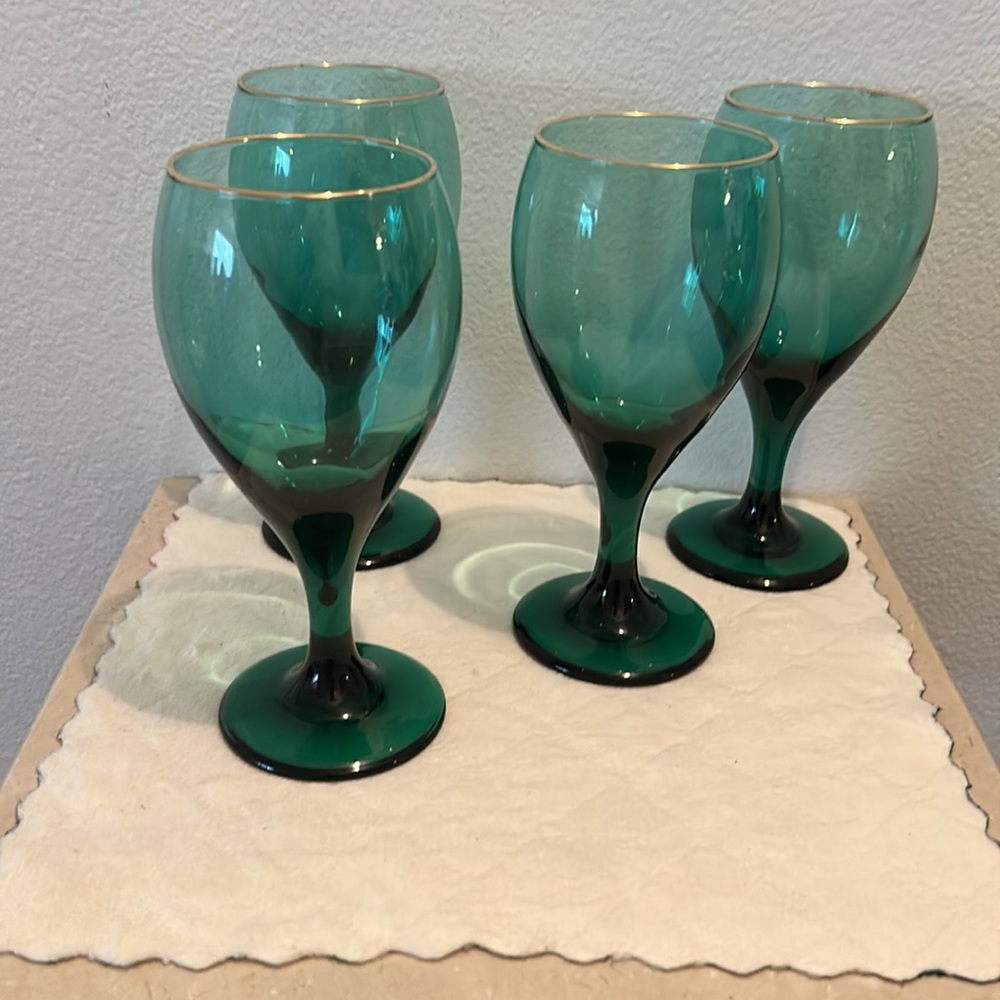 4  vintage Libbey Juniper Green teardrop glasses with gold rims.